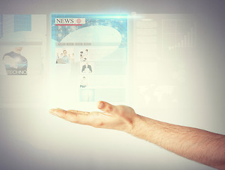 Image showing man with virtual screen and news