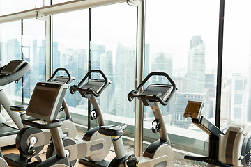 Image showing exercise bikes in city gym