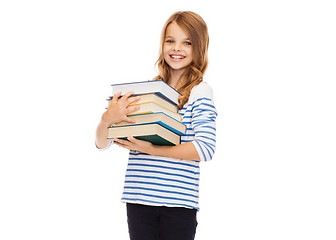 Image showing little student girl with many books