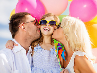 Image showing family with colorful balloons