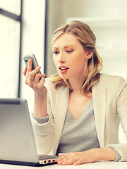 Image showing businesswoman with cell phone