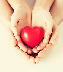 Image showing woman and man hands with heart