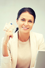 Image showing lovely woman with euro cash money