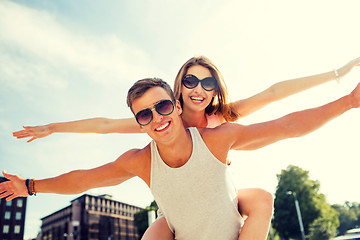 Image showing smiling couple having fun in city