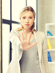 Image showing young woman making stop gesture