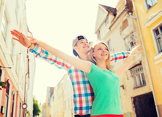 Image showing smiling couple in city