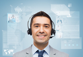 Image showing smiling businessman in headset