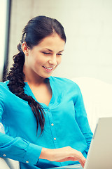 Image showing happy woman with laptop computer