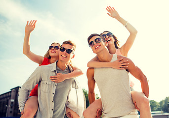 Image showing smiling couple having fun in city