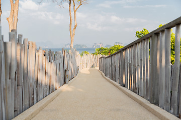 Image showing road with fence at seaside