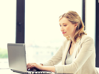 Image showing happy woman with laptop computer