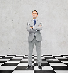 Image showing happy smiling businessman in suit