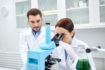 Image showing young scientists making test or research in lab