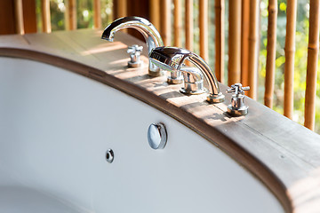 Image showing close up of bathtub at exotic asian hotel