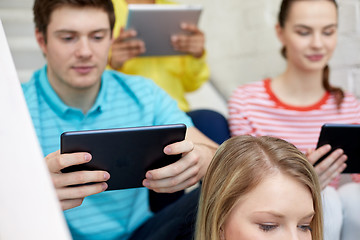 Image showing close up of students with tablet pc at school