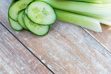 Image showing close up of cucumber slices and celery