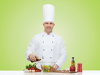 Image showing happy male chef cook cooking food