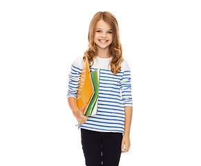 Image showing child holding colorful folders