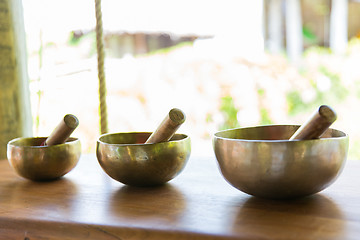 Image showing set of three pounders on table at hotel spa