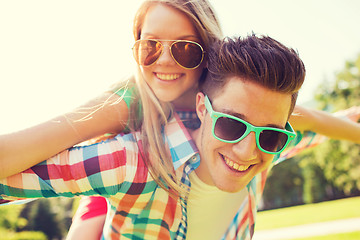 Image showing smiling couple having fun in park