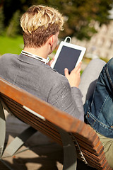 Image showing young man tablet pc computer in park or campus