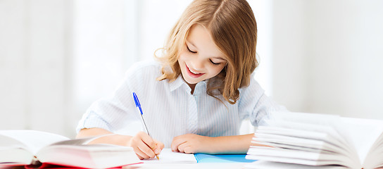 Image showing student girl studying at school