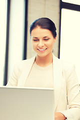 Image showing happy woman with laptop computer