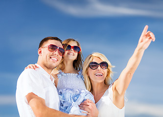 Image showing happy family with blue sky