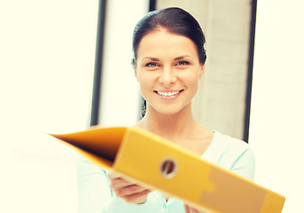 Image showing woman with folder