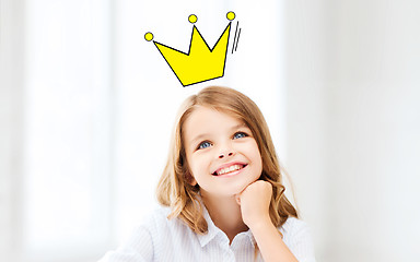 Image showing smiling little school girl with crown