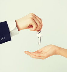 Image showing man and woman with house keys