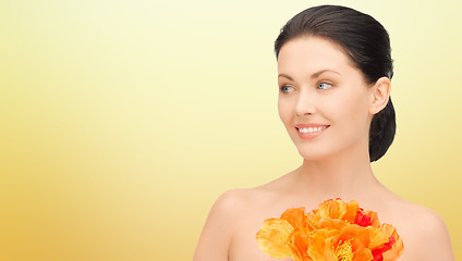 Image showing beautiful young woman with flowers