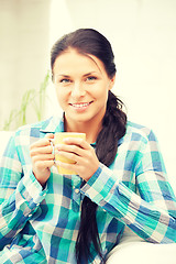 Image showing lovely housewife with mug