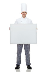 Image showing happy male chef cook holding white blank big board