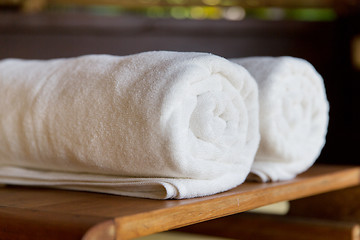 Image showing rolled bath towels at hotel spa