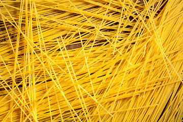 Image showing italian spaghetti on wooden background