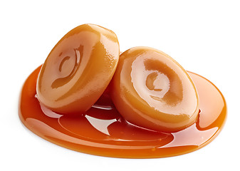 Image showing caramel candies and sweet sauce
