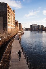 Image showing Man Walks Boardwalk Downtown Milwaukee Wisconsin River Walk 