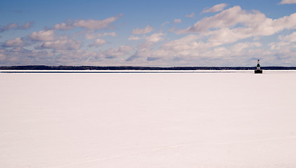 Image showing Frozen Lake Michigan Solid Ice Blue Sky Nautical Beacon