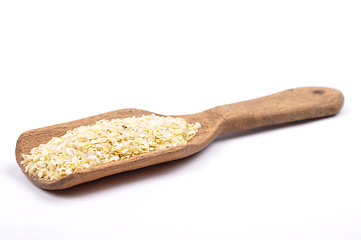 Image showing Millet flakes on shovel