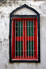 Image showing stone town and a old window closed