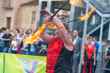 Image showing Dance with fire or fire show in the program Youth meeting in boxing match between teams of Russia and Cuba