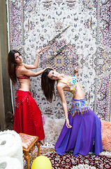 Image showing Girl on background of carpet Arab style