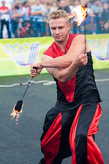 Image showing Dance with fire or fire show in the program Youth meeting in boxing match between teams of Russia and Cuba