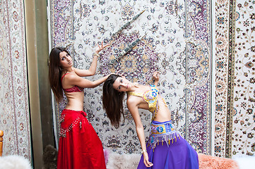 Image showing Girl on background of carpet Arab style