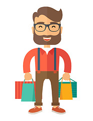 Image showing Funny businessman with shopping bags