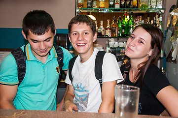 Image showing The young man behind the bar