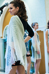 Image showing The girl in the Orenburg downy shawl,