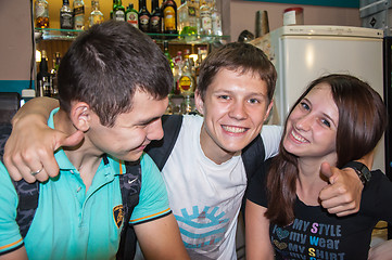 Image showing The young man behind the bar