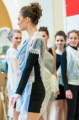 Image showing The girl in the Orenburg downy shawl,